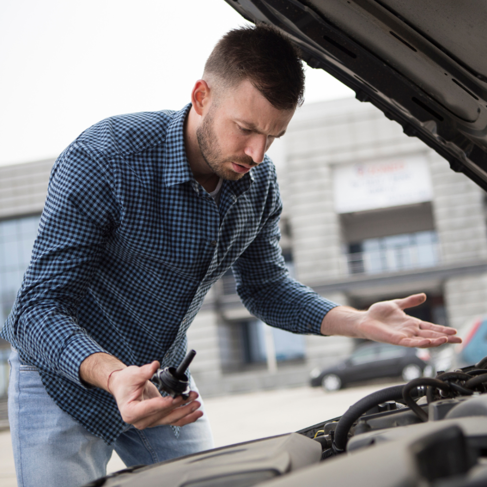 Man having car trouble