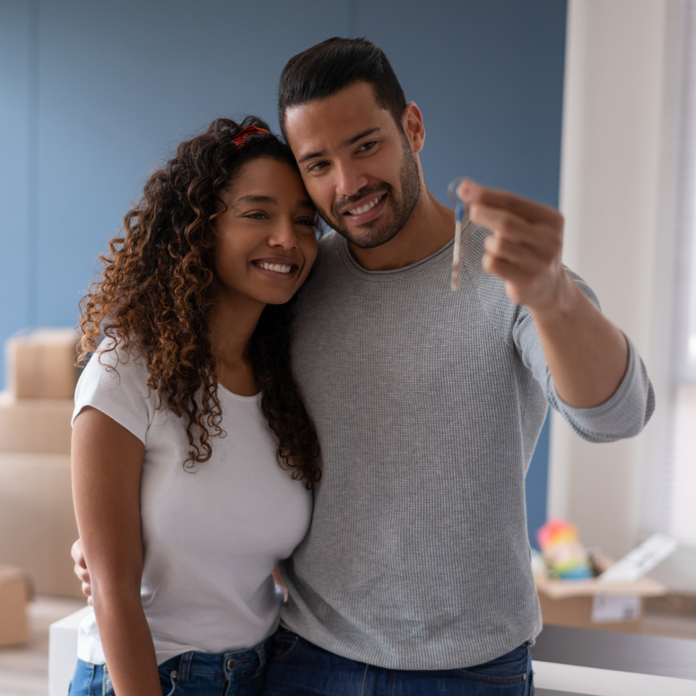 Couple admiring their new house key