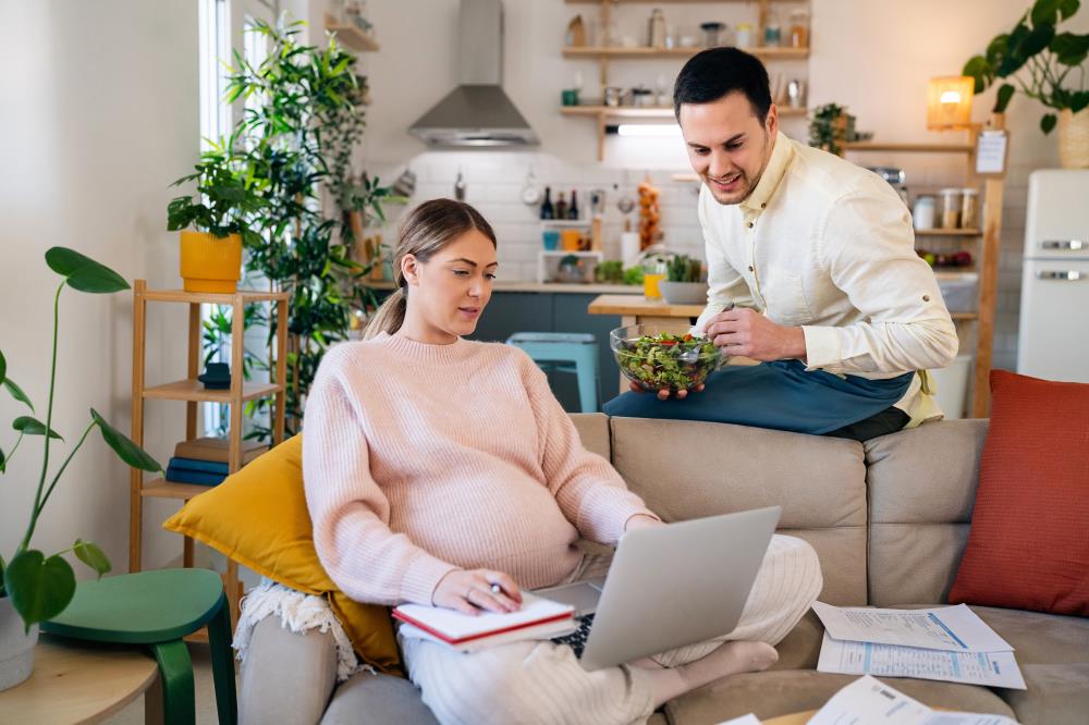 Couple Expecting Baby Planning Finances