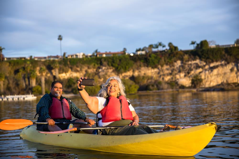 Retired Couple Taking a Selfie in a Kayak