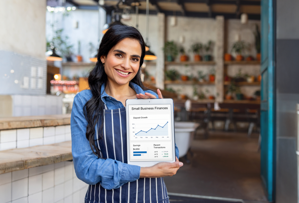 Woman holding a rising chart