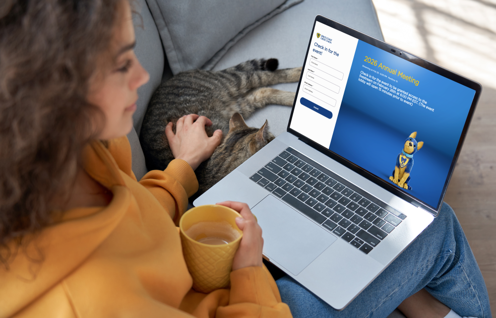 Woman viewing SCCU Annual Membership meeting link.