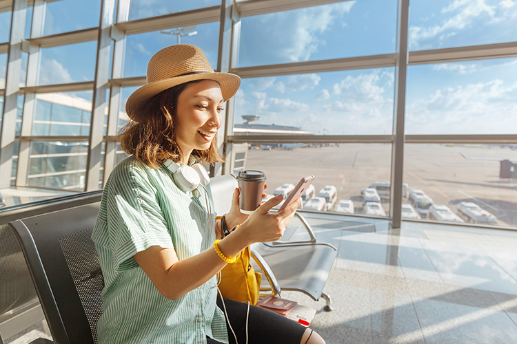 Woman on phone in airport
